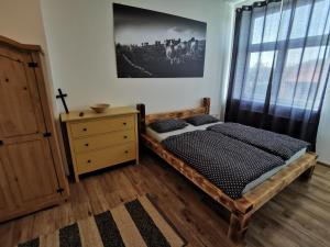 Posteľ alebo postele v izbe v ubytovaní Penzion Loučka Bystřice