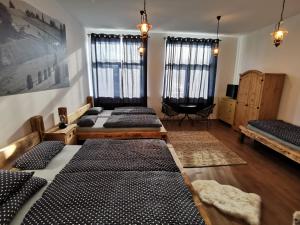 Postel nebo postele na pokoji v ubytování Penzion Loučka Bystřice