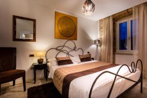 Postel nebo postele na pokoji v ubytování Hotel Heritage Forza