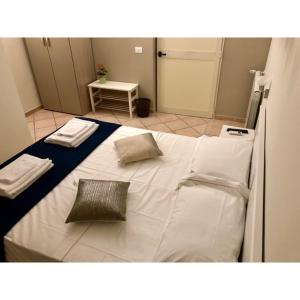 Postel nebo postele na pokoji v ubytování B&B Luminari