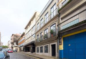 Afbeelding uit fotogalerij van LovelyStay - Stylish Central Apartment by Bolhão Market in Porto