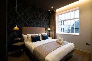 Urban Rest Camden客房内的一张或多张床位