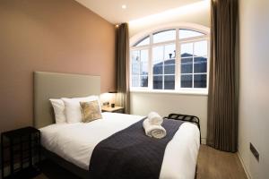 Urban Rest Camden客房内的一张或多张床位
