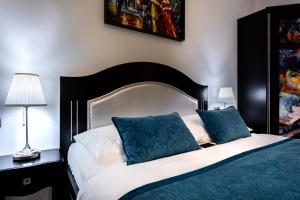 Postel nebo postele na pokoji v ubytování Hotel Heritage Forza