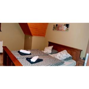 Posteľ alebo postele v izbe v ubytovaní Apartament "Baja" Zakopane - Kościelisko, Basen, Sauna