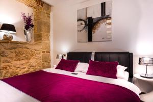 Postel nebo postele na pokoji v ubytování Hotel Heritage Forza