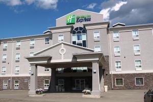 a hotel with a sign on top of it at Holiday Inn Express Yorkton East, an IHG Hotel in Yorkton