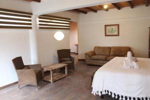 Coin salon dans l'établissement Hotel boutique Teocalli
