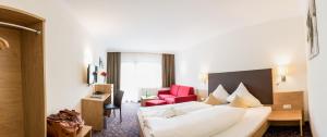 Ένα ή περισσότερα κρεβάτια σε δωμάτιο στο Hotel Puint