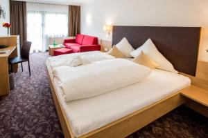 Ένα ή περισσότερα κρεβάτια σε δωμάτιο στο Hotel Puint