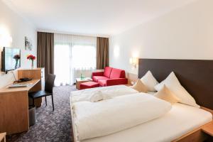 Ένα ή περισσότερα κρεβάτια σε δωμάτιο στο Hotel Puint