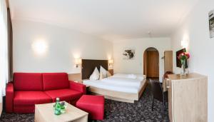Ένα ή περισσότερα κρεβάτια σε δωμάτιο στο Hotel Puint