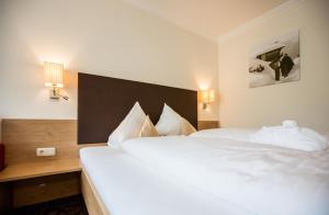 Ένα ή περισσότερα κρεβάτια σε δωμάτιο στο Hotel Puint