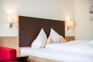 Ένα ή περισσότερα κρεβάτια σε δωμάτιο στο Hotel Puint