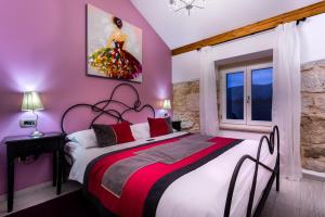 Postel nebo postele na pokoji v ubytování Hotel Heritage Forza