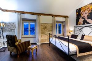 Postel nebo postele na pokoji v ubytování Hotel Heritage Forza