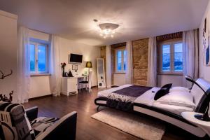 Postel nebo postele na pokoji v ubytování Hotel Heritage Forza