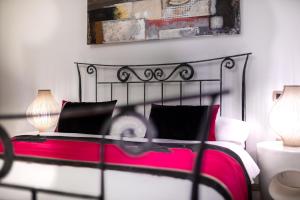 Postel nebo postele na pokoji v ubytování Hotel Heritage Forza