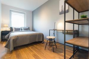 Posteľ alebo postele v izbe v ubytovaní Wodna Street Big Family Apartment