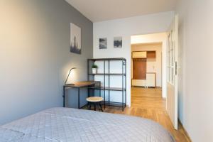 Posteľ alebo postele v izbe v ubytovaní Wodna Street Big Family Apartment