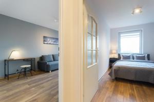 Posteľ alebo postele v izbe v ubytovaní Wodna Street Big Family Apartment