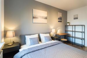 Posteľ alebo postele v izbe v ubytovaní Wodna Street Big Family Apartment