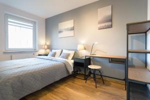 Posteľ alebo postele v izbe v ubytovaní Wodna Street Big Family Apartment