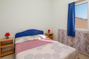 Postel nebo postele na pokoji v ubytování Apartments & Restaurant Galeb