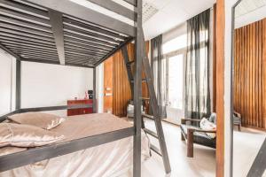 Postel nebo postele na pokoji v ubytování M&F Apartaments Gran Via