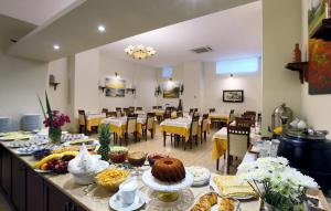 a table with food on it in a restaurant at Hotel Expocity Istanbul in Avcılar