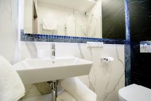 Kúpeľňa v ubytovaní Hotel Sjesta