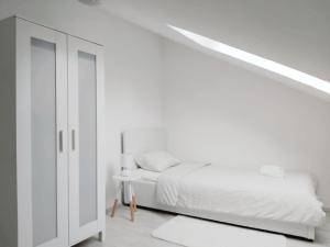 Posteľ alebo postele v izbe v ubytovaní Apartman DORIS-Sveta Nedelja