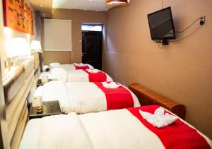 Katil atau katil-katil dalam bilik di Hotel Royal Qosqo