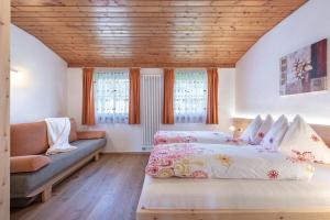 Ένα ή περισσότερα κρεβάτια σε δωμάτιο στο Harrerhof