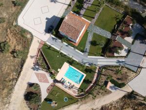 an overhead view of a house with a swimming pool at La Marabulla in Ronda +43 photos