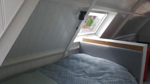Katil atau katil-katil dalam bilik di B&B Alkmaars Toppunt