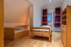 Postel nebo postele na pokoji v ubytování A&A Apartmany