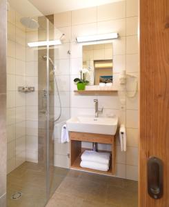 Kúpeľňa v ubytovaní Hotel Garni Schieferle