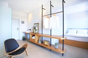 Posteľ alebo postele v izbe v ubytovaní Basilico Suites Adults Only by Estia
