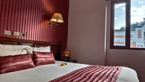 Letto o letti in una camera di Hotel Real Audiencia