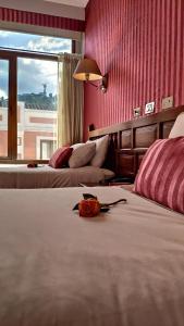 Letto o letti in una camera di Hotel Real Audiencia