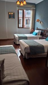 Letto o letti in una camera di Hotel Real Audiencia