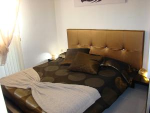 A bed or beds in a room at Apartamento Esquinzo Jandía