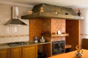Majoituspaikan Quinta da Ribeira keittiö tai keittotila