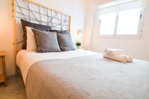 Posteľ alebo postele v izbe v ubytovaní P&P Apartaments Carrera de Capuchinos