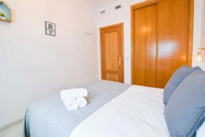 Posteľ alebo postele v izbe v ubytovaní P&P Apartaments Carrera de Capuchinos