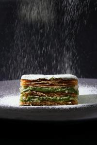a stack of sandwiches on a plate in the rain at The Landis Taipei in Taipei