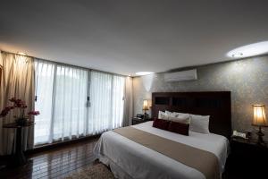 Postel nebo postele na pokoji v ubytování Colombe Hotel Boutique