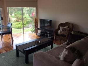 a living room with a couch and a coffee table at Forrest River Valley in Forrest