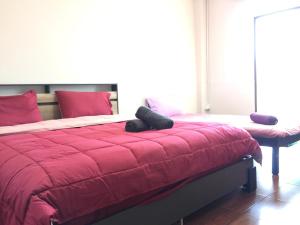 Postel nebo postele na pokoji v ubytování SMILE HOME GUESTHOUSE